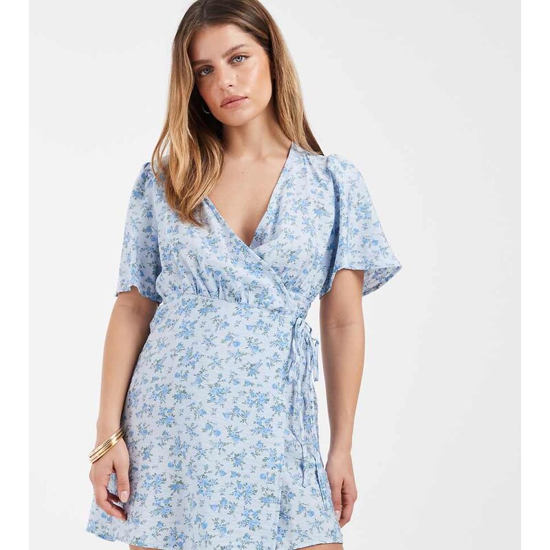 Vero Moda Petite flutter sleeve wrap front mini dress in blue
