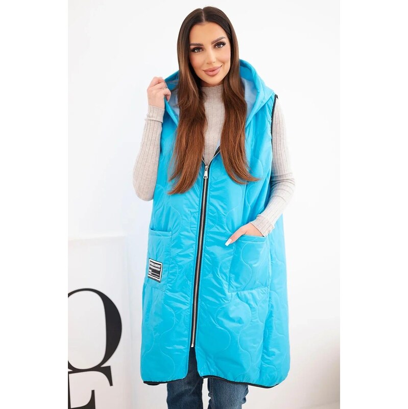 MladaModa Prošívaná oversize vesta s kapucí a zipem model 5393