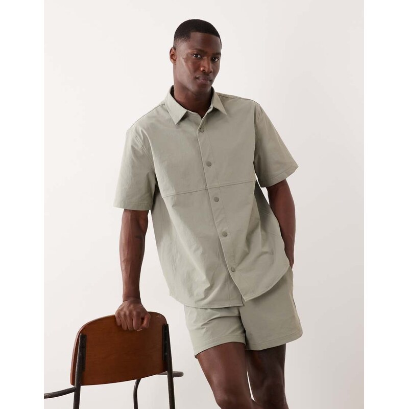 ASOS DESIGN motionMAX shorter length shorts with curved hem in