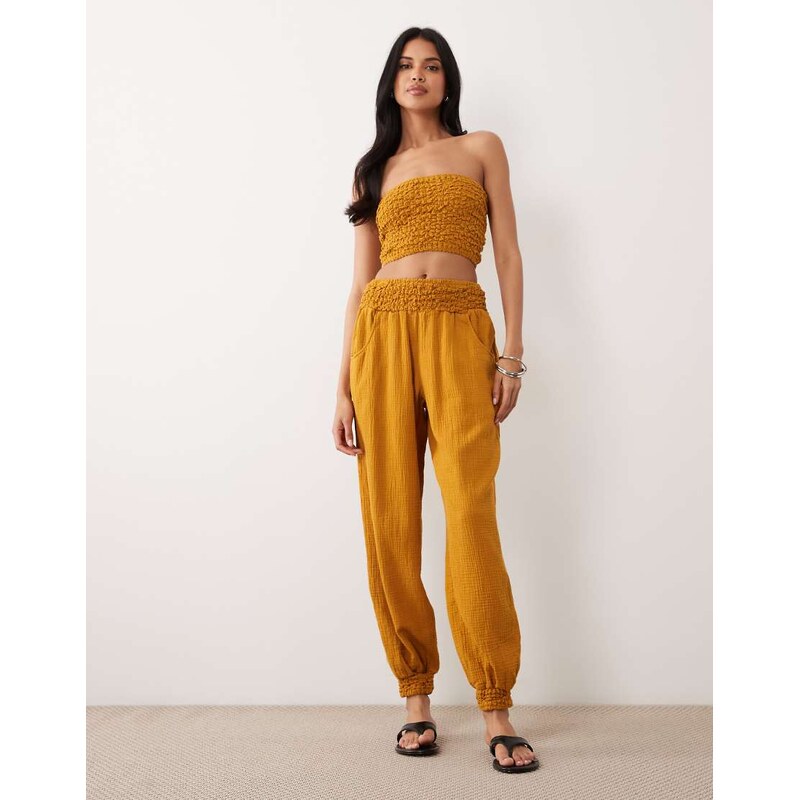 ASOS DESIGN cheesecloth shirred waist balloon trouser in gold-Brown 115521321