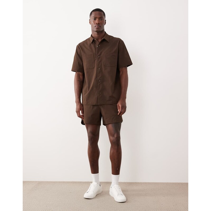 ASOS DESIGN motionMAX shorter length shorts with curved hem in