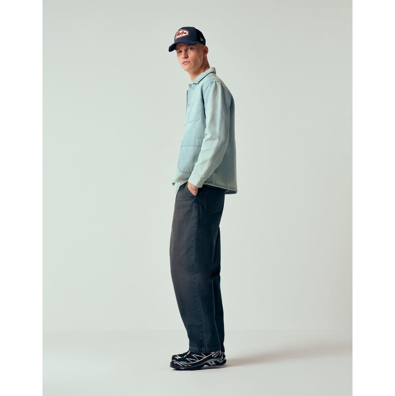 ASOS DESIGN relaxed tapered jeans in dark wash blue with pleats
