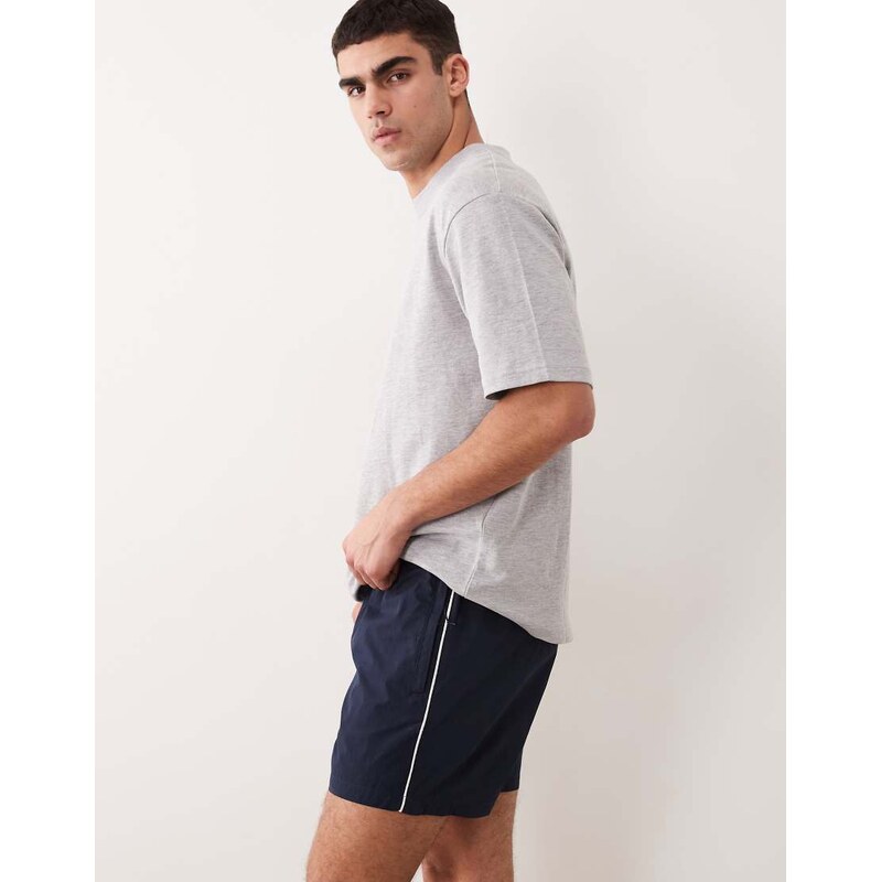 ASOS DESIGN wide mid length elasticated nylon short with piping