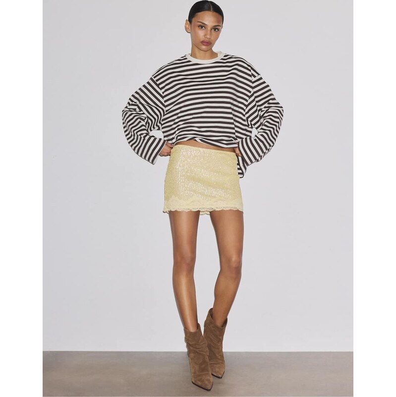 Stradivarius Sequin mini skirt with lace trim in yellow 114811973