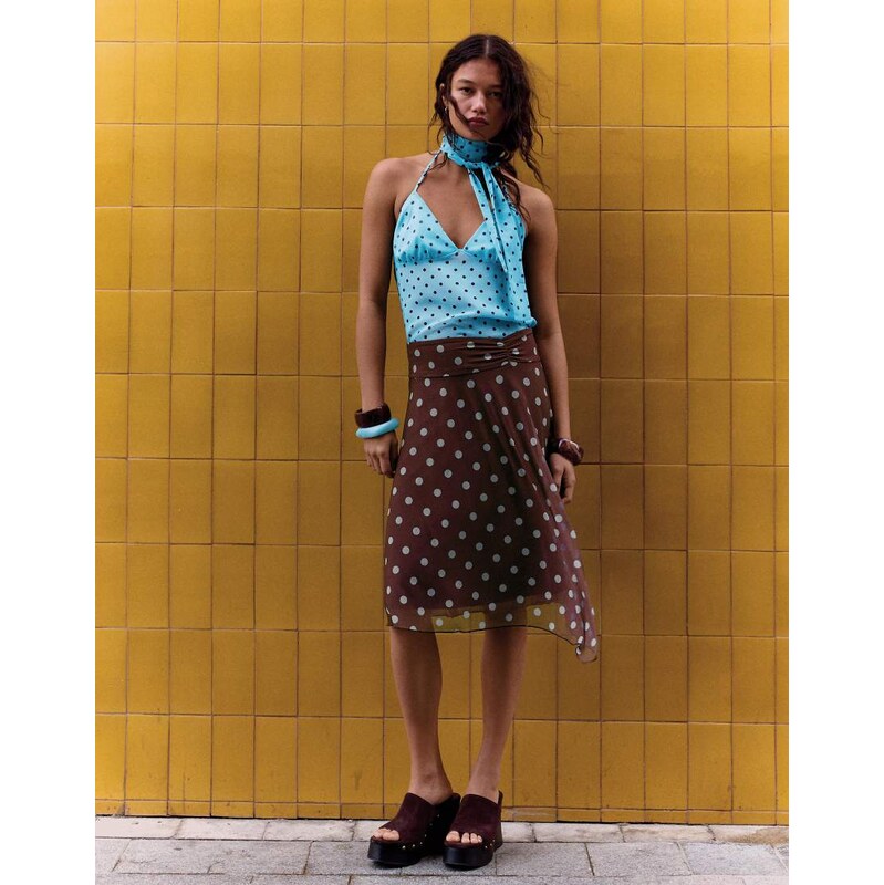 Bershka Asymmetric polka dot midi skirt in brown 114814606