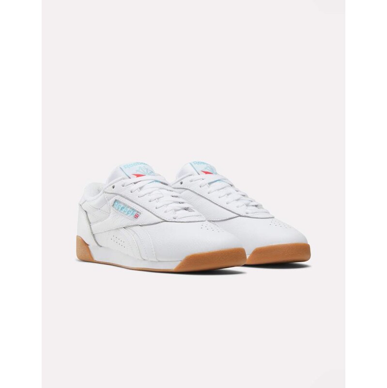 Reebok Freestyle Lo womens trainers in white with gum sole