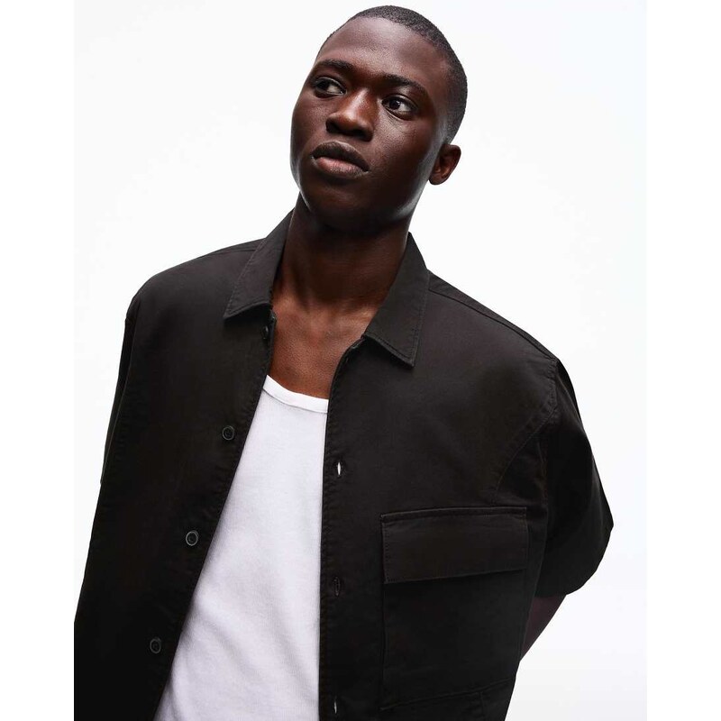 Bershka Boxy short sleeve shirt in black
