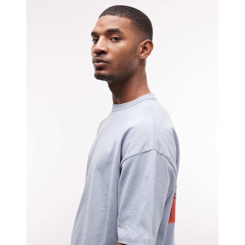 ASOS DESIGN oversized t-shirt with flamingo graphic in washed blue