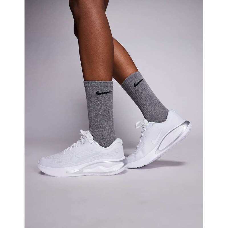 Nike Running Journey Run trainers in white and silver