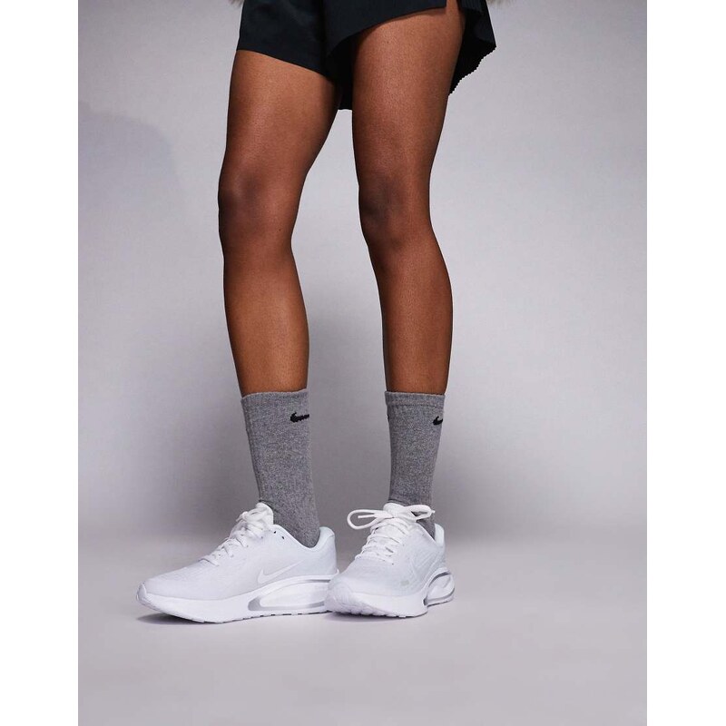 Nike Running Journey Run trainers in white and silver