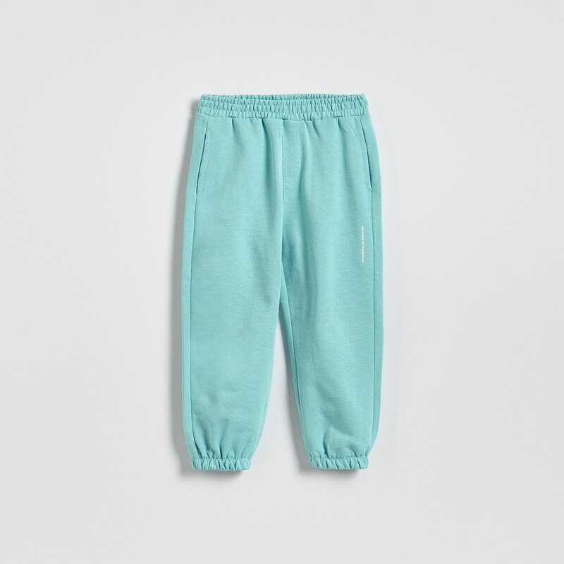Reserved - Bavlněné jogger kalhoty - mátově zelená