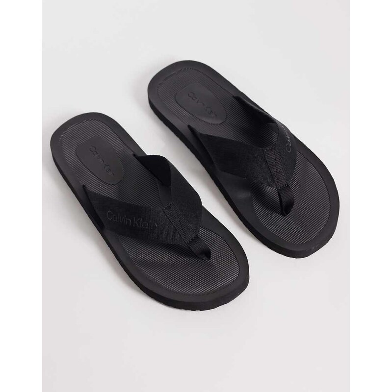 Calvin Klein flip flops in black