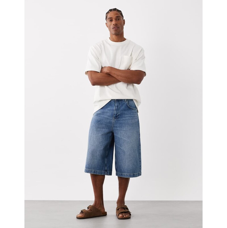 ASOS DESIGN longer length denim jorts in vintage mid wash blue