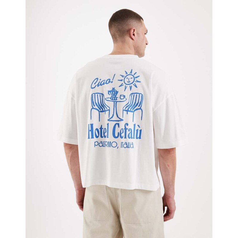 ASOS DESIGN boxy oversized t-shirt with hotel graphic in white