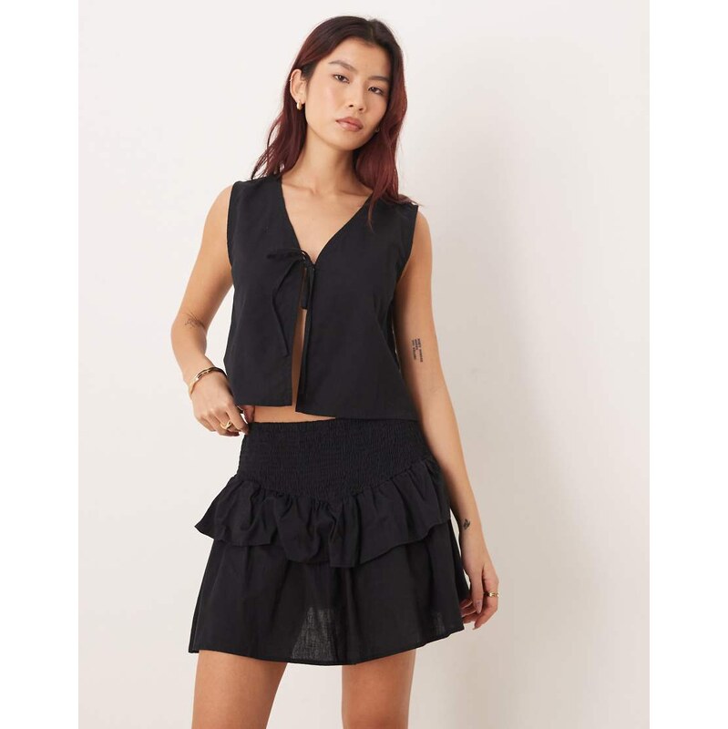 Esmee shirred tier mini beach skirt in black 114856139