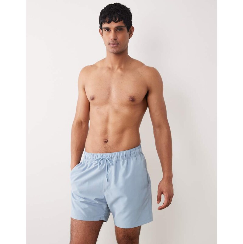 ASOS DESIGN swim shorts in mid length in blue