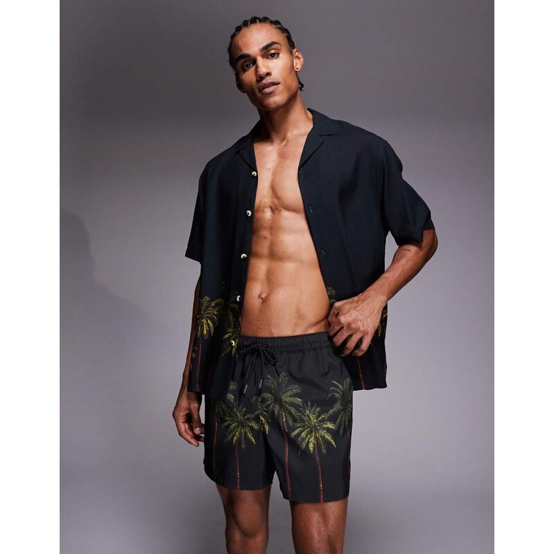 ASOS DESIGN co-ord swim shorts in short length with palm tree