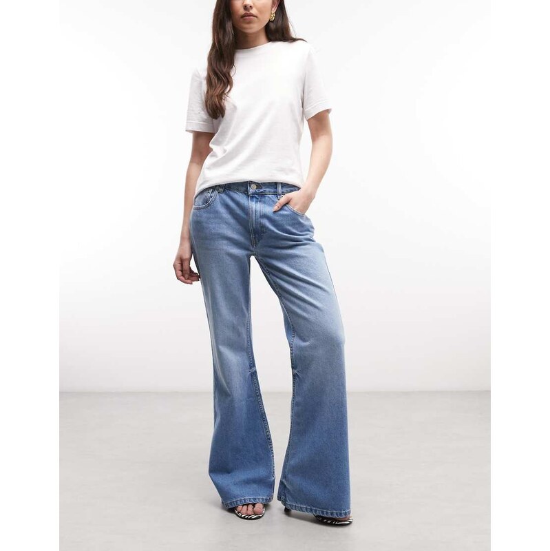 ASOS DESIGN relaxed flare jean in light midwash-Blue