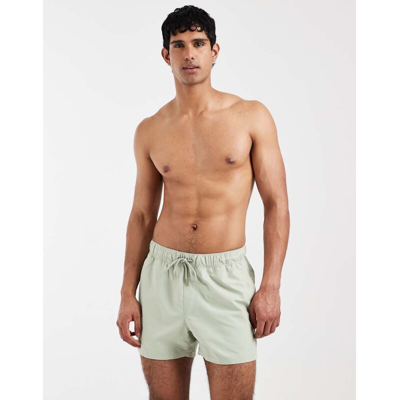 ASOS DESIGN swim shorts in short length in sage green