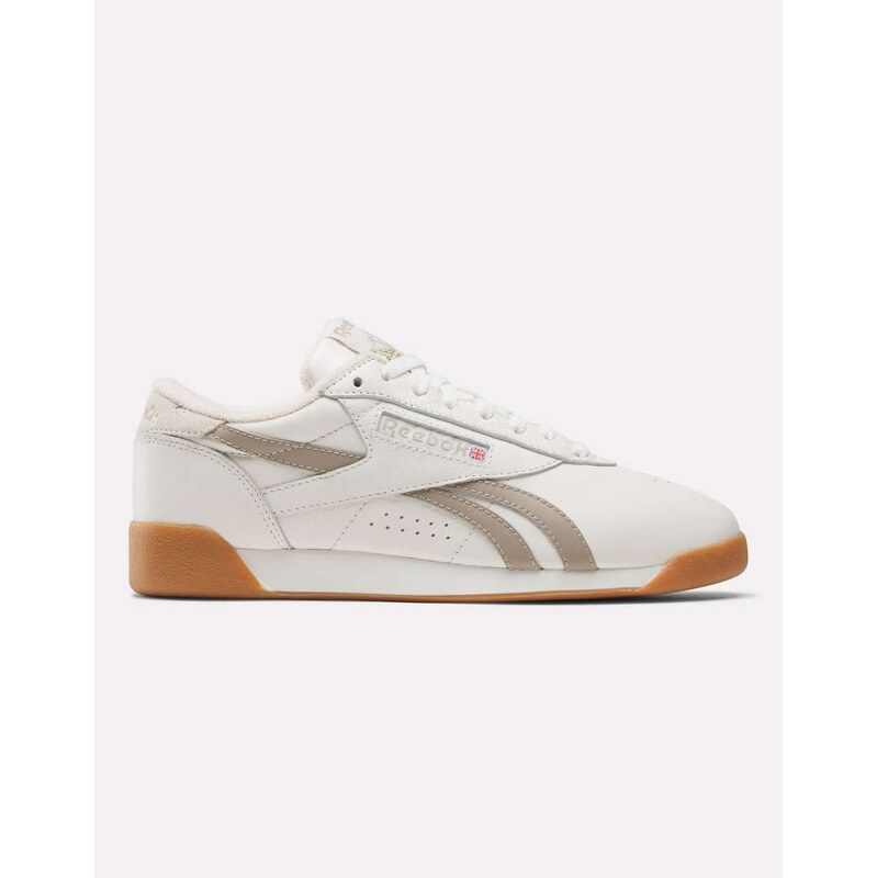 Reebok Freestyle Lo womens trainers in white with gum sole
