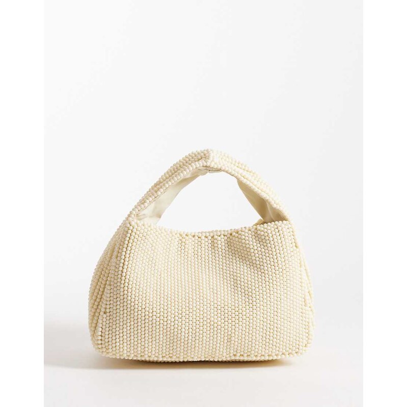 Accessorize beaded handheld bag in butter yellow