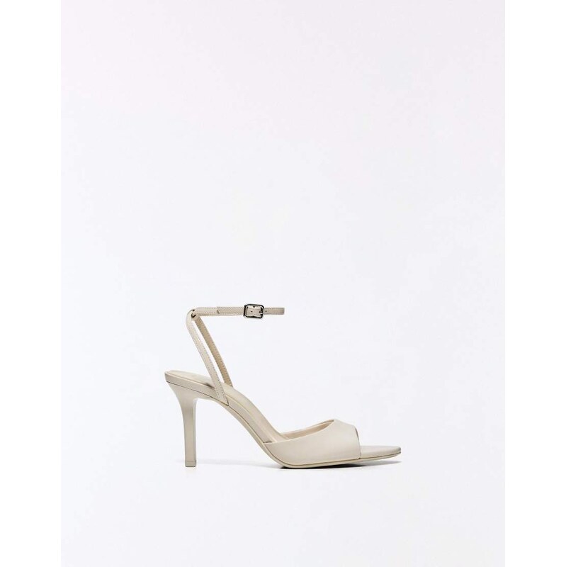 Bershka Heeled sandals with ankle strap in beige-Neutral 114927910