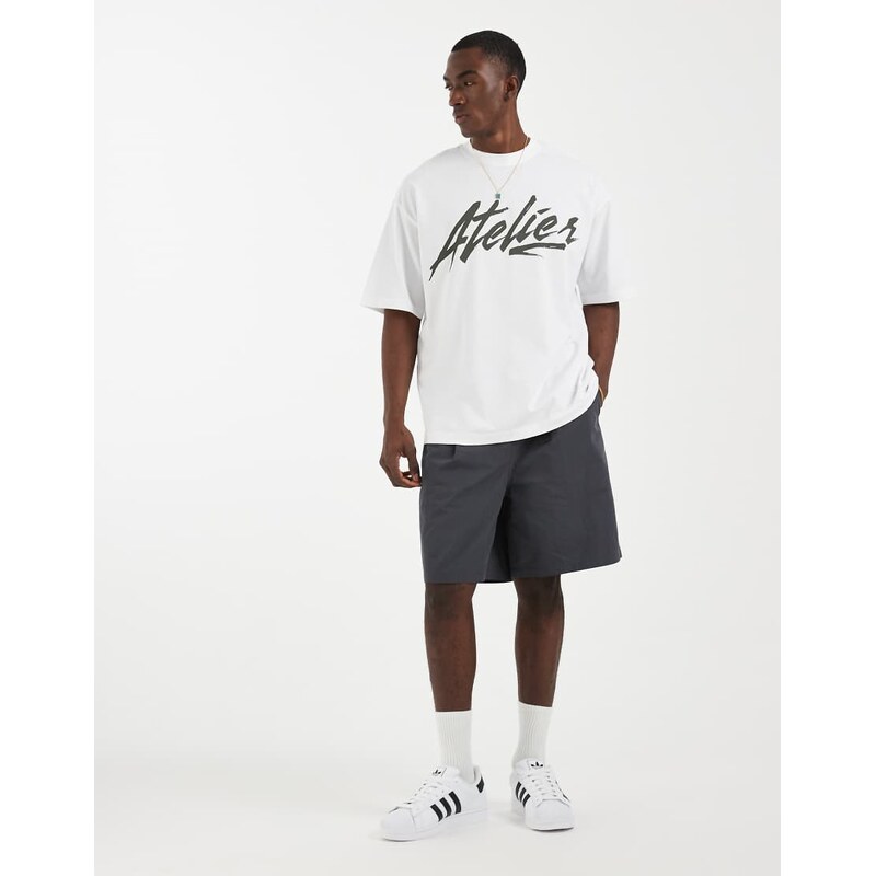 ASOS DESIGN oversized t-shirt with Atelier graphic in white