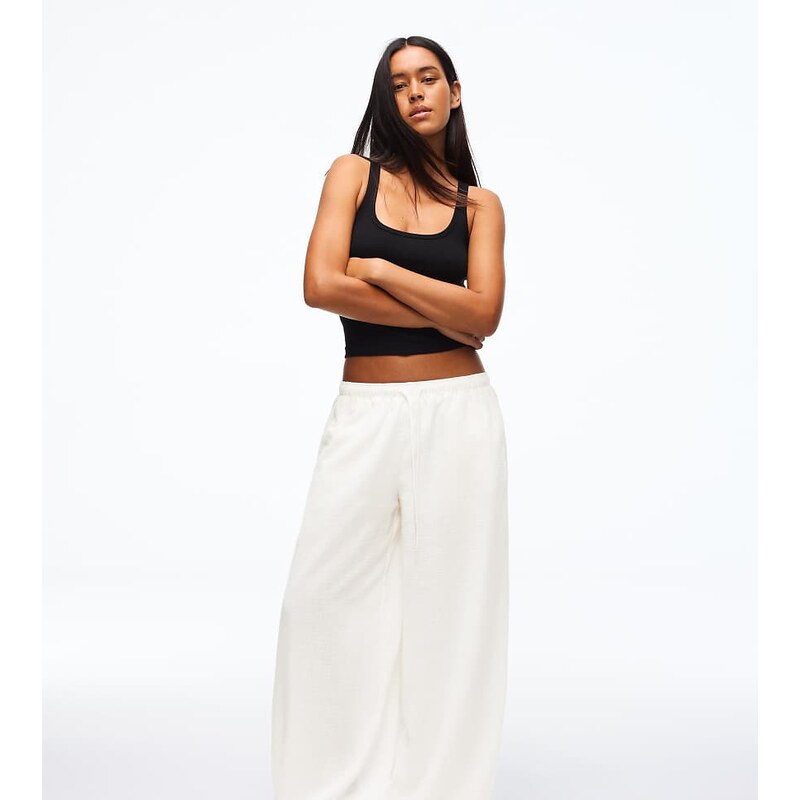 Bershka Petite rustic sarouel trousers in white