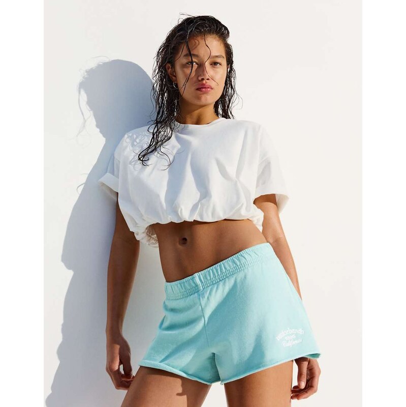 Bershka Embroidered fleece shorts in blue