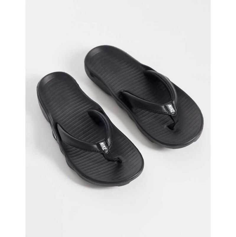 Nike Marina flip flops in black 114962087