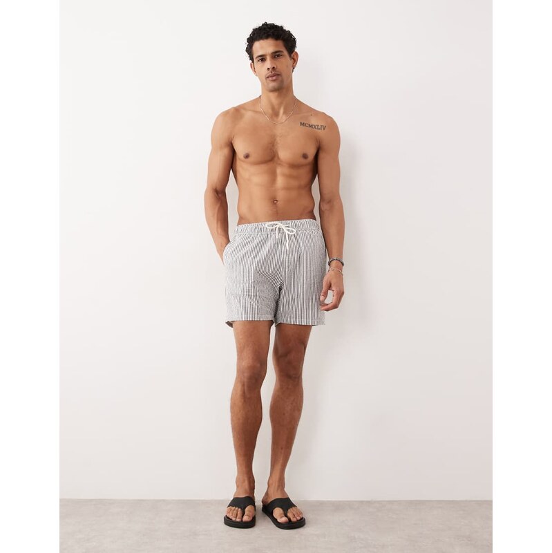 ASOS DESIGN seersucker swim shorts in mid length in black stripe