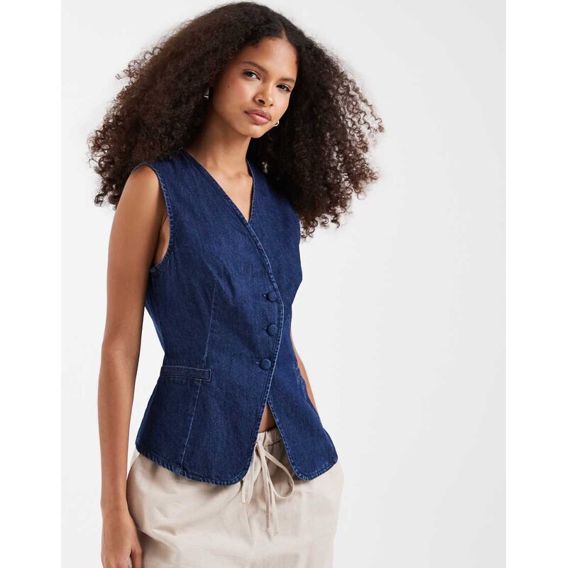 Vero Moda denim asymmetric placket waistcoat with covered buttons in medium blue wash