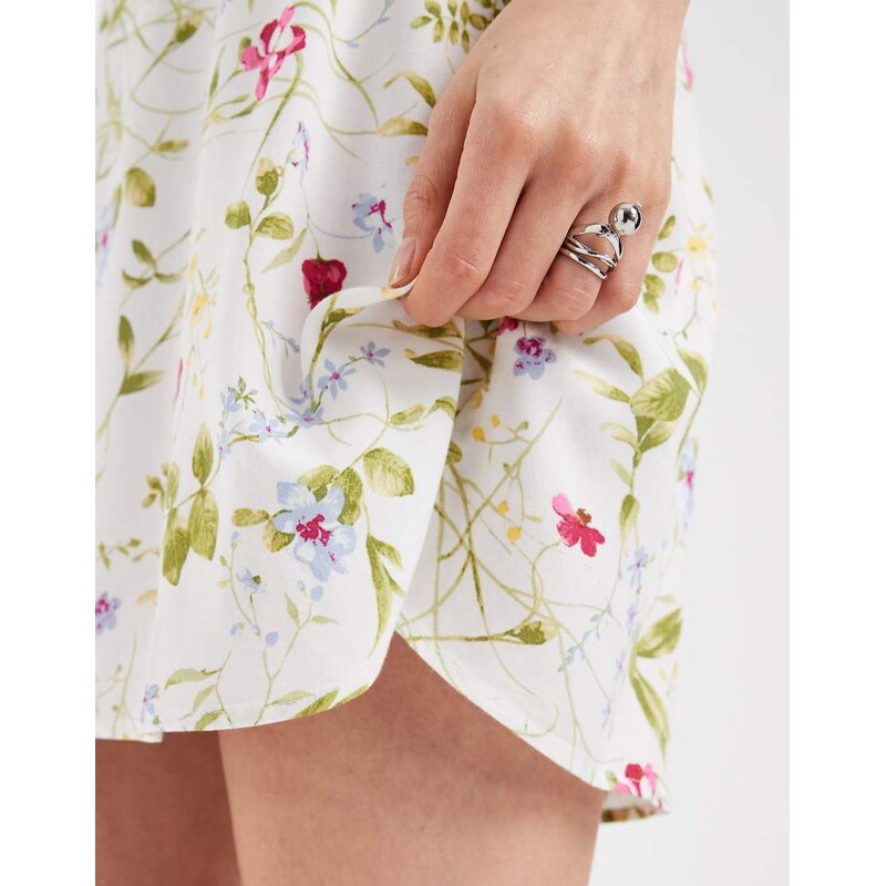 Vero Moda Easy tie shoulder cami mini dress in white wild floral print