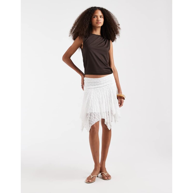 Pieces asymmetric hem flippy lace mini skirt in black-White 114962282
