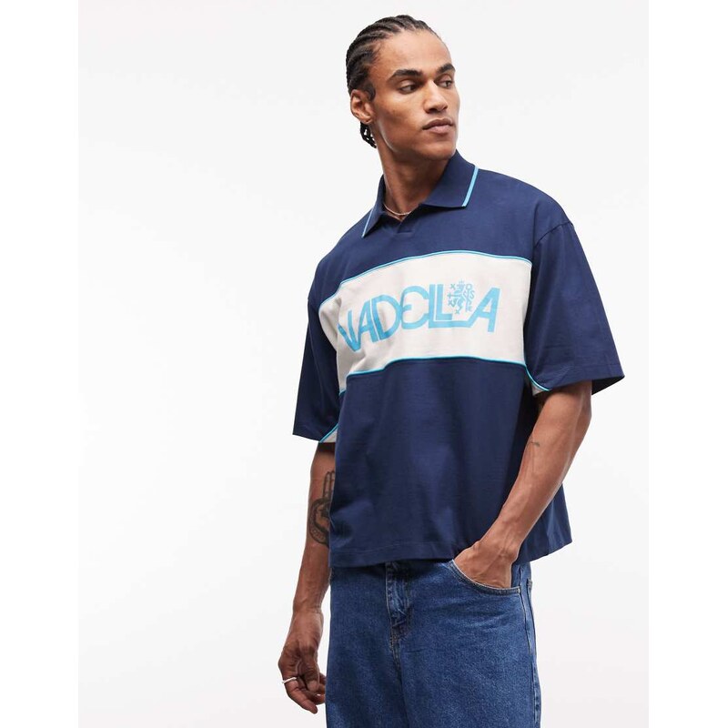 ASOS DESIGN boxy oversized polo with cut and sew panelling and