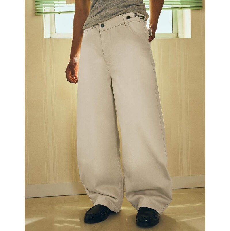 Bershka Embroidered barrel-leg trousers in beige-Neutral