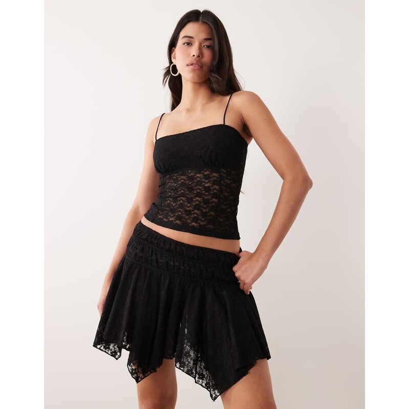 ASOS DESIGN asymmetric lace layered mini skirt in black
