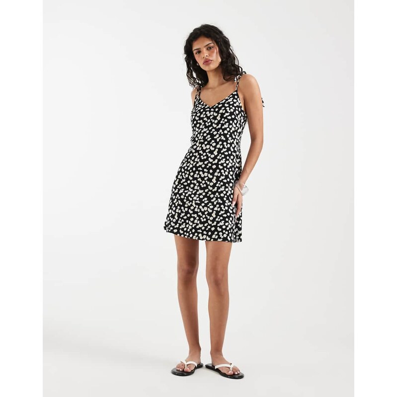 Vero Moda Easy tie shoulder cami mini dress in black ditsy daisy