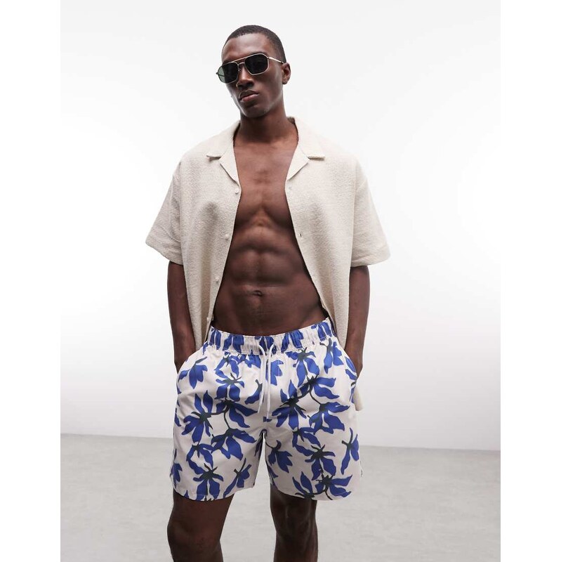 ASOS DESIGN swim shorts in mid length in blue floral print-White