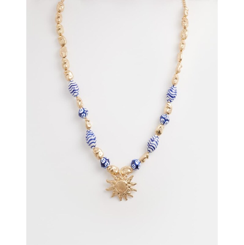 Accessorize sun charm riviera beaded neckalce in blue 114983876