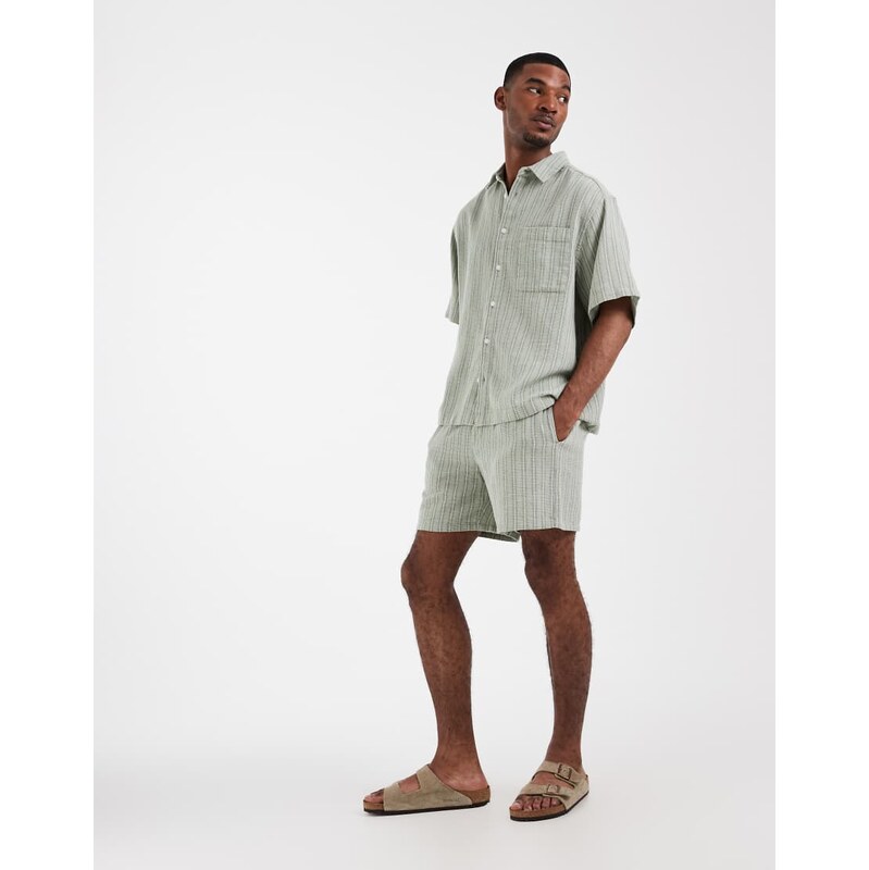 ASOS DESIGN co-ord textured mid length shorts in sage green