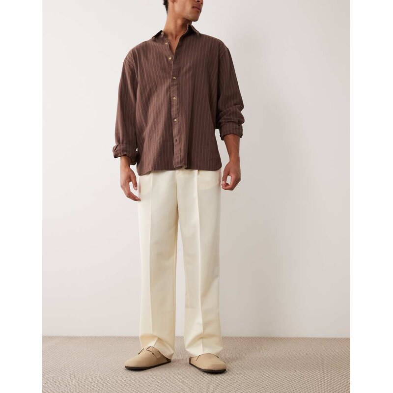 ASOS DESIGN tailored pleated wide leg trousers in butter yellow