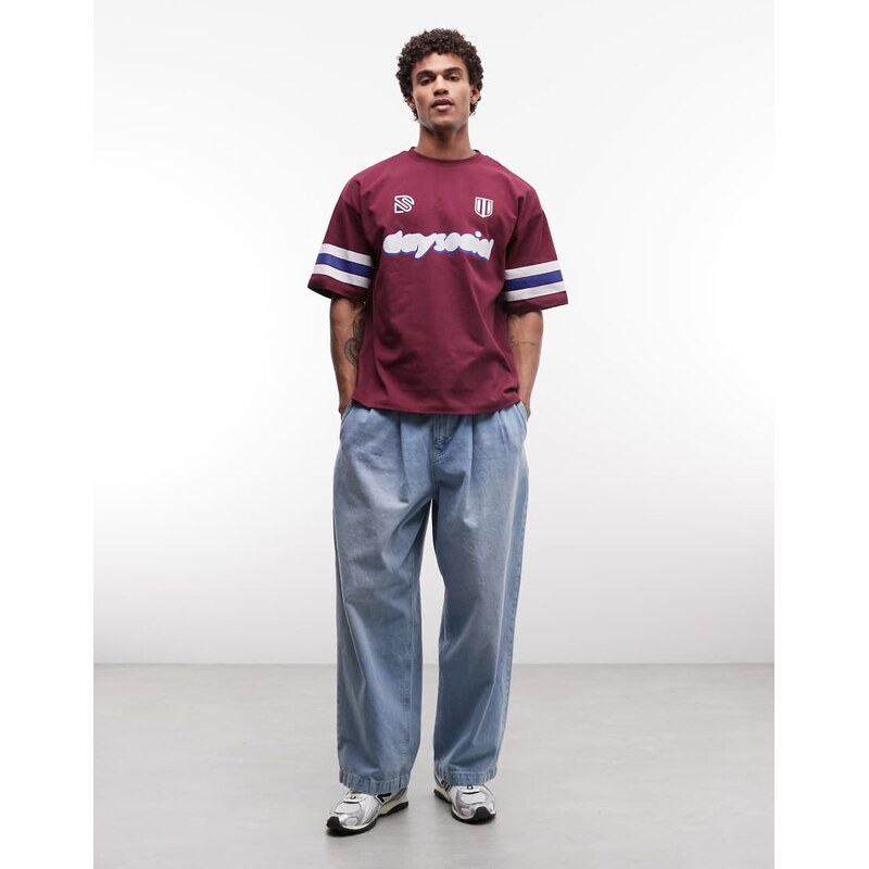 ASOS DESIGN oversized t-shirt with football bubble graphic in maroon-Red