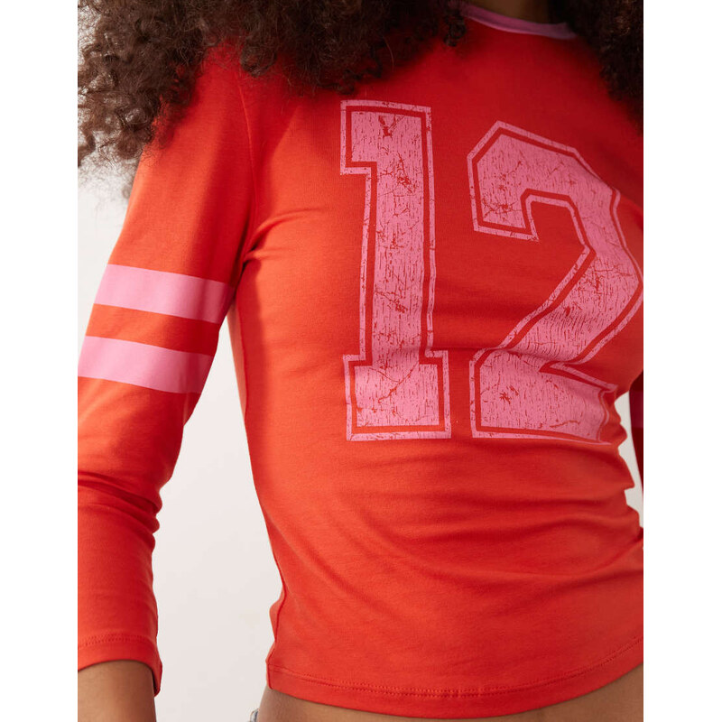 ASOS DESIGN 3/4 sleeve baby tee with varsity graphic in red and pink-Multi