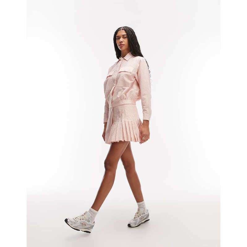 Lacoste co-ord stripe tennis skirt in orange & white