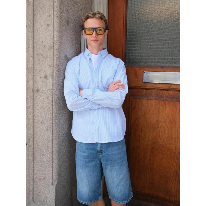 TEESHOPPEN Kalhoty  Denim shorts  modrý melír