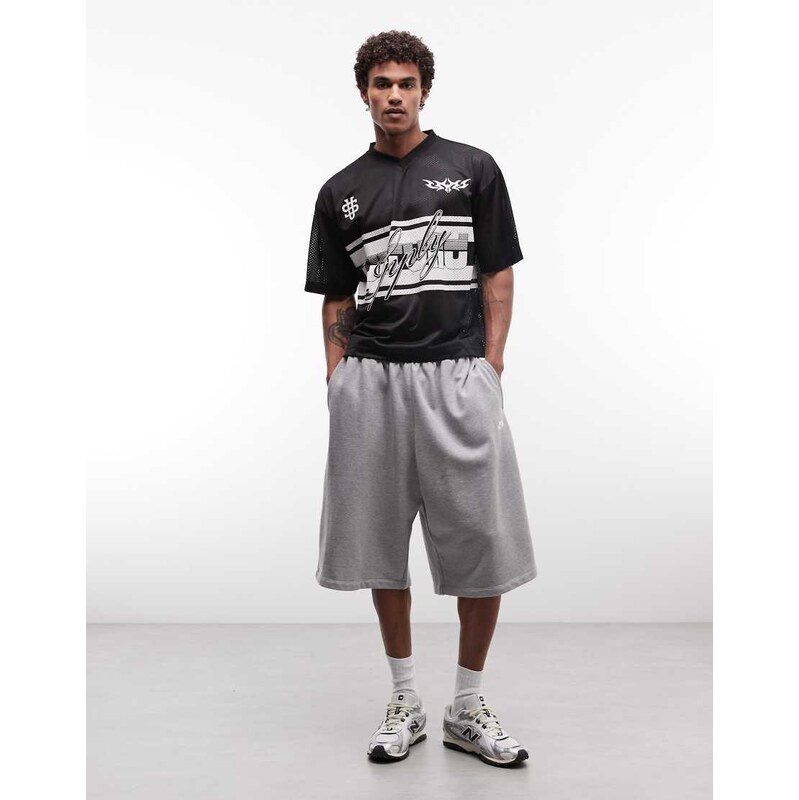 ASOS DESIGN boxy oversized drop shoulder t-shirt with football graphic in black airtex fabric
