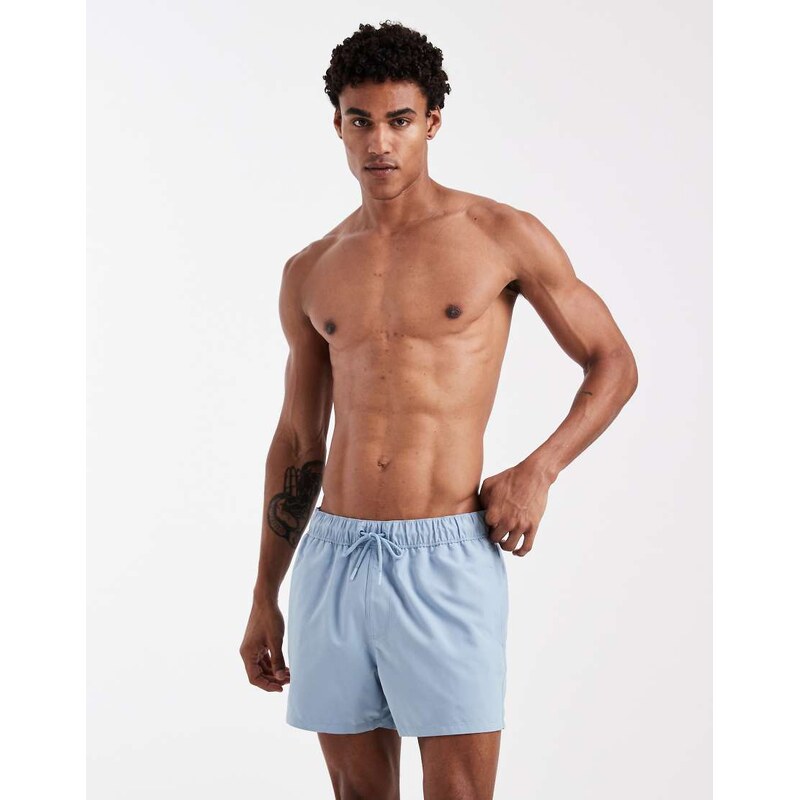 ASOS DESIGN swim shorts in short length in blue