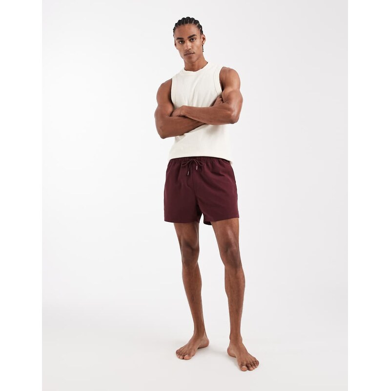 ASOS DESIGN swim shorts in short length in burgundy-Red