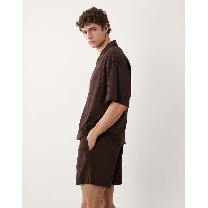 ASOS DESIGN co-ord crinkle texture shorts in mid length in brown